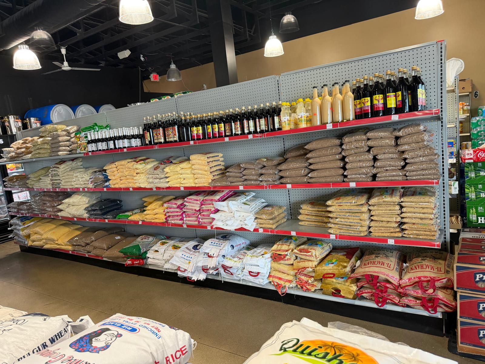 Pantry & Staples — Haitian, Caribbean, African, and Asian pantry staples — rice, beans, oils, canned goods, and everyday international groceries.